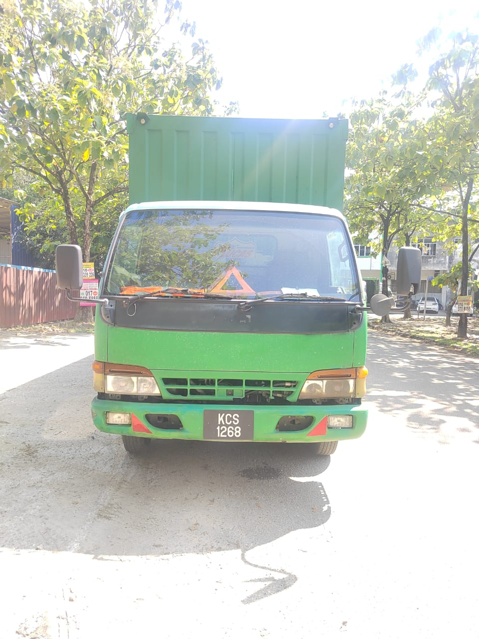 USED ISUZU NPR CURTAINSIDER 2010 - Image 1